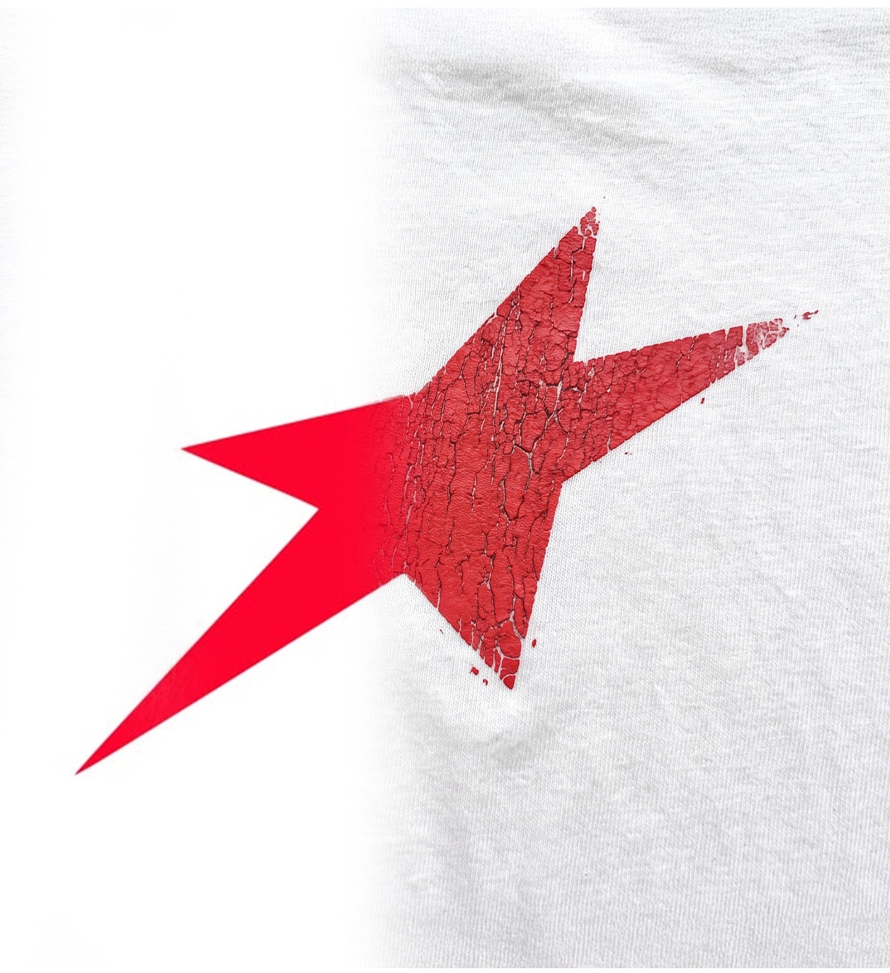 Red star graphic printed on white fabric